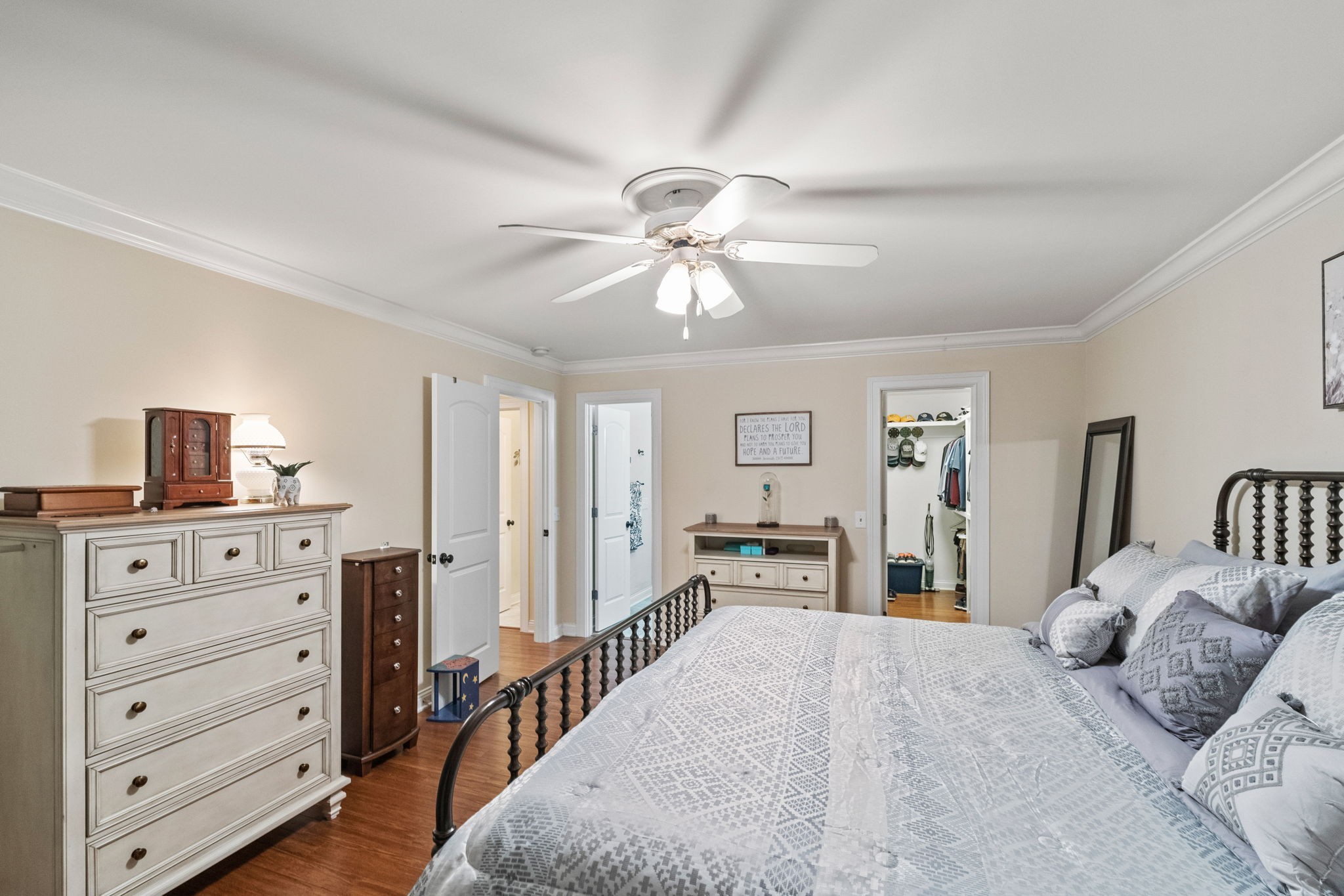 612 Fairway Trail Springfield, TN 37172 - Photo 15 of 50 a bedroom with a bed and a chandelier