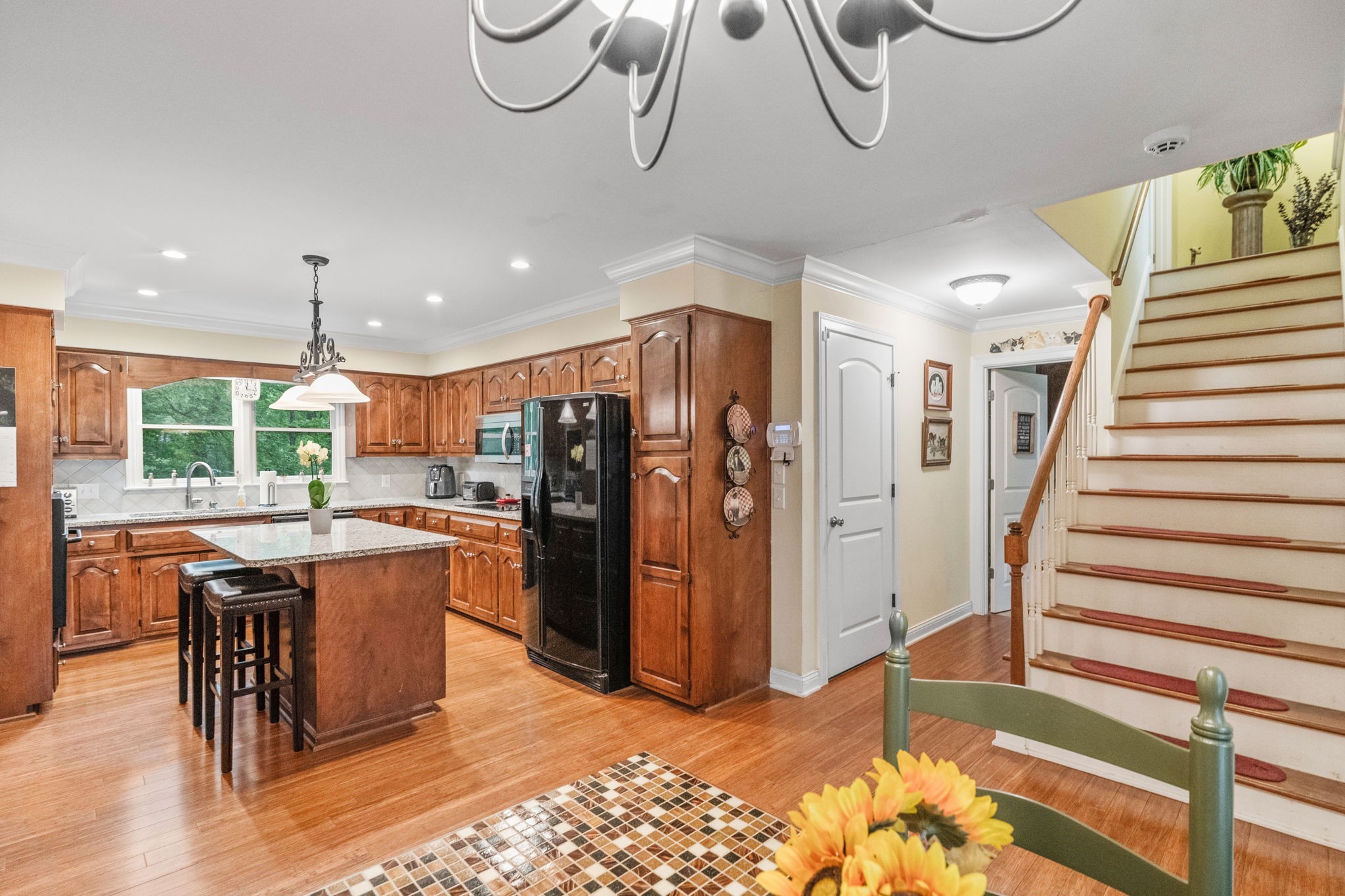 612 Fairway Trail Springfield, TN 37172 - Photo 36 of 50 a kitchen with stainless steel appliances granite countertop a refrigerator and a sink