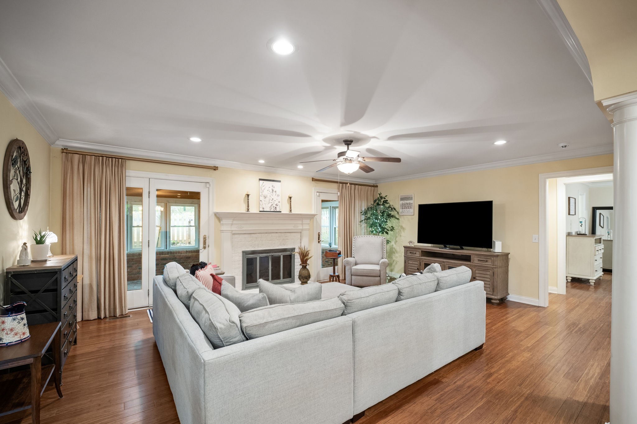 612 Fairway Trail Springfield, TN 37172 - Photo 9 of 50 a living room with furniture a fireplace and a flat screen tv