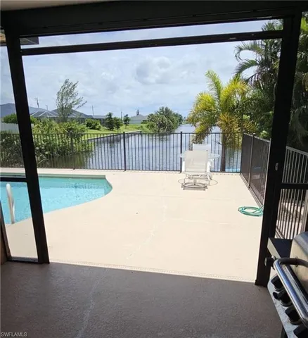 a view of balcony with furniture