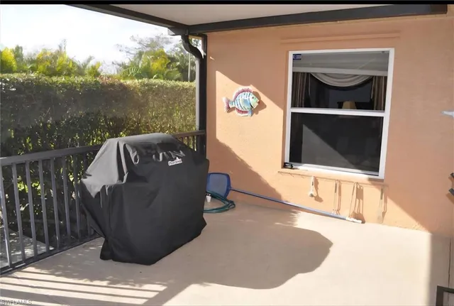 a view of a yard with cars