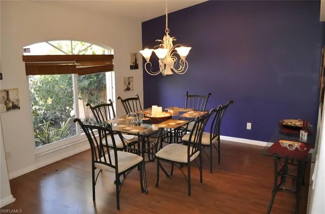 a view of livingroom with furniture and workspace