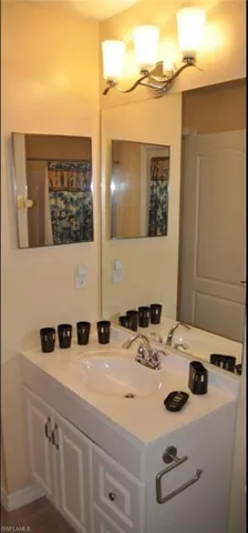 a bathroom with a toilet and shower
