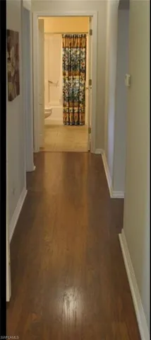 a room with a table and a window