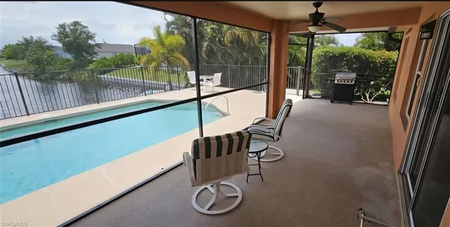 a balcony with chairs