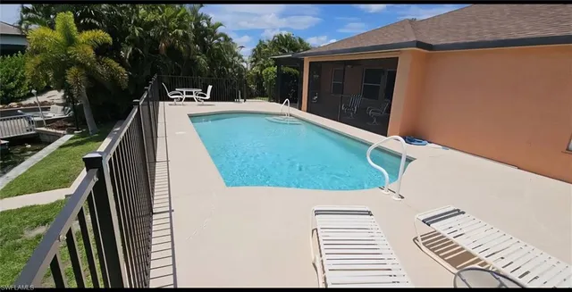 a view of a balcony with chairs
