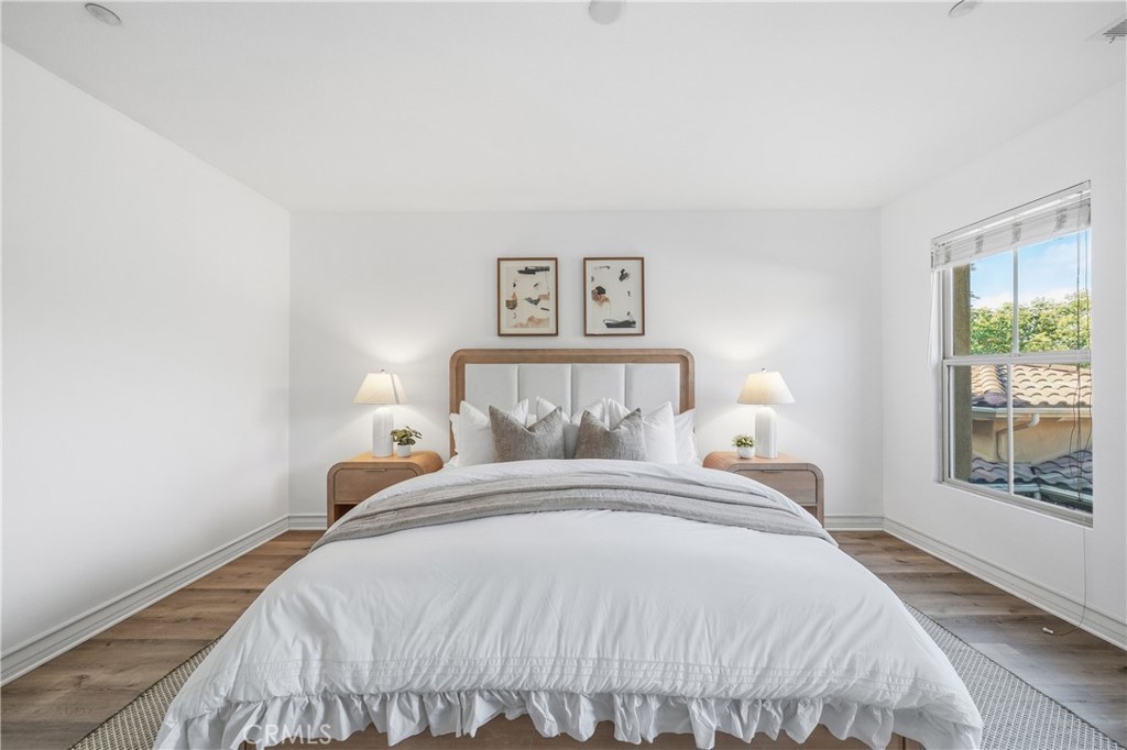 123 Chantilly Irvine, CA 92620 - Photo 17 of 31 a bedroom with a bed and a window