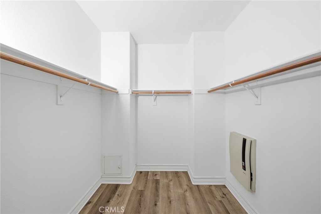 123 Chantilly Irvine, CA 92620 - Photo 19 of 31 a view of a room with wooden floor and white walls