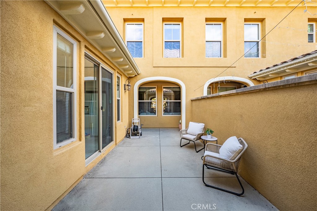 123 Chantilly Irvine, CA 92620 - Photo 27 of 31 a view of two chairs in the balcony