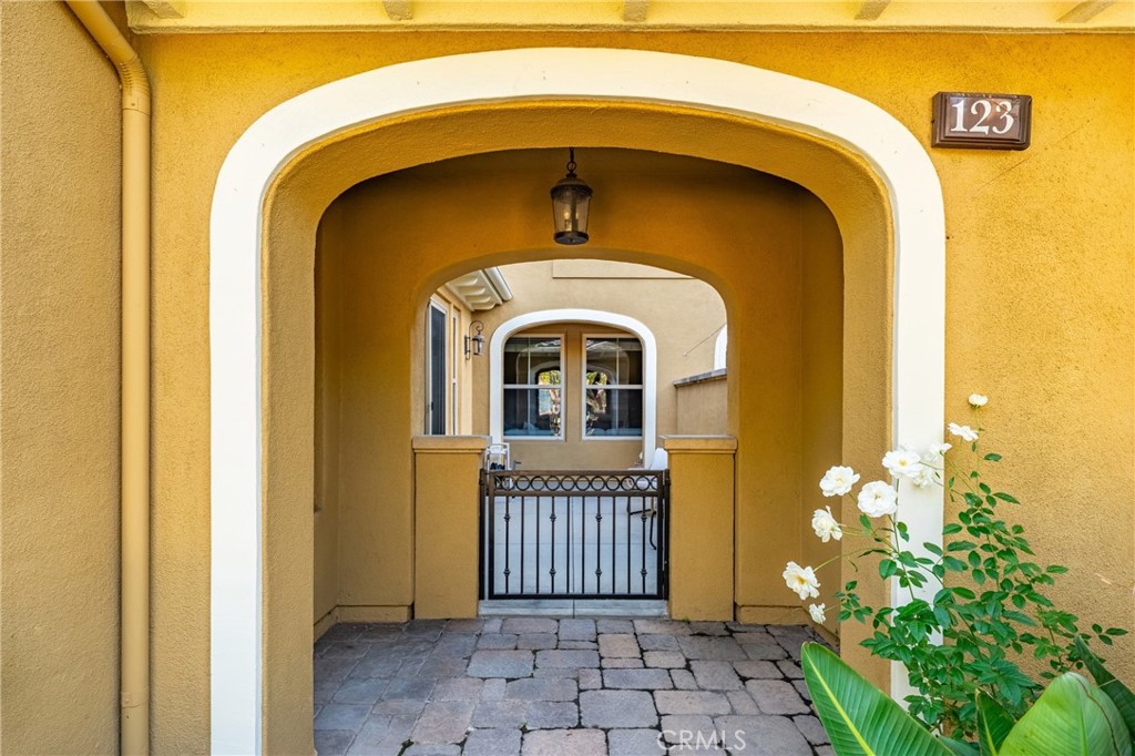 123 Chantilly Irvine, CA 92620 - Photo 28 of 31 a front view of a house with a glass door