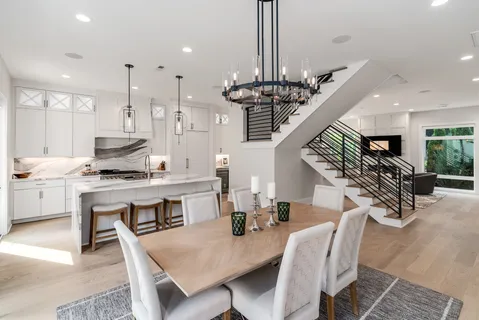 a living room with fireplace furniture and a flat screen tv