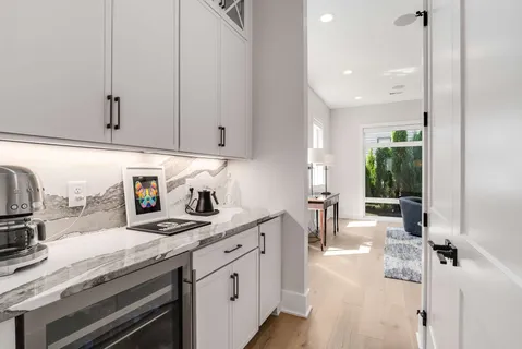 a view of a livingroom with a window and couch