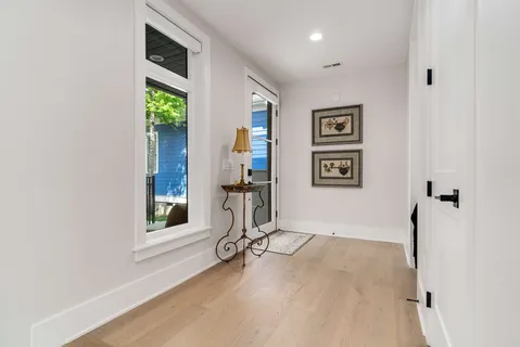 a bedroom with a bed and a television