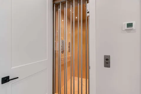 a bathroom with a tub sink toilet and mirror