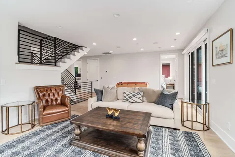 a view of a terrace with sitting area