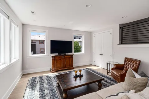 a view of a chairs and table in the patio