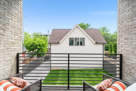 a view of a pathway with a potted plants