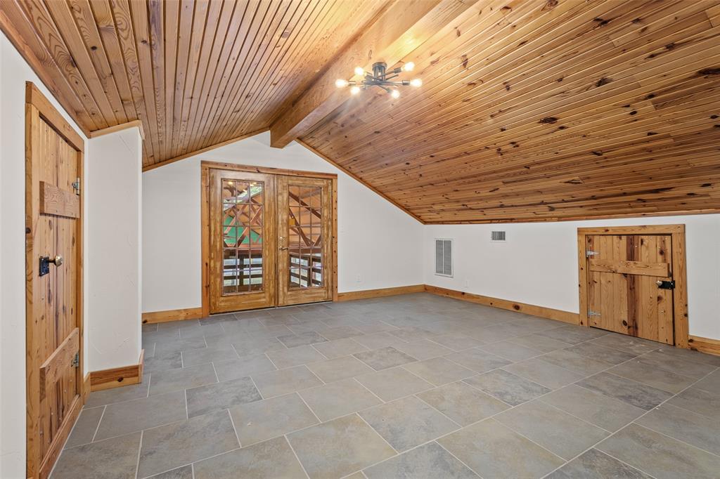 411 Hidden Meadows Lane Denison, TX 75021 - Photo 16 of 40 a view of an empty room with a window