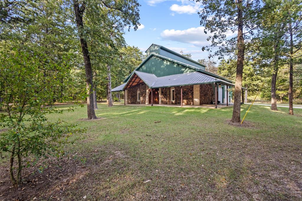 411 Hidden Meadows Lane Denison, TX 75021 - Photo 19 of 40 a view of an house with backyard space and balcony