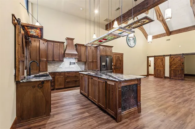 a bathroom with a toilet and shower