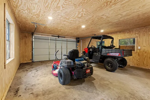a view of a wooden deck with furniture