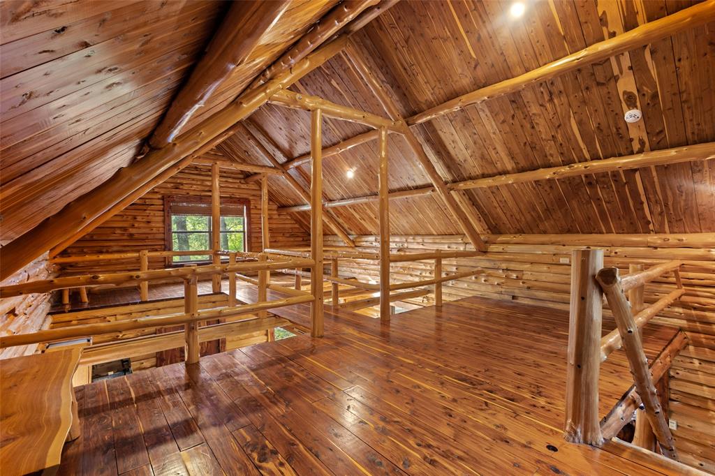 411 Hidden Meadows Lane Denison, TX 75021 - Photo 37 of 40 a view of a balcony with wooden floor
