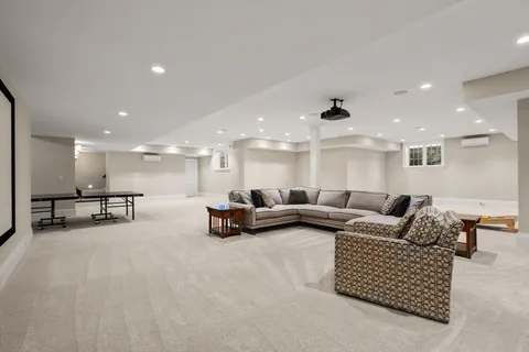 a living room with furniture and a table