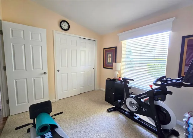 a room with furniture and a window