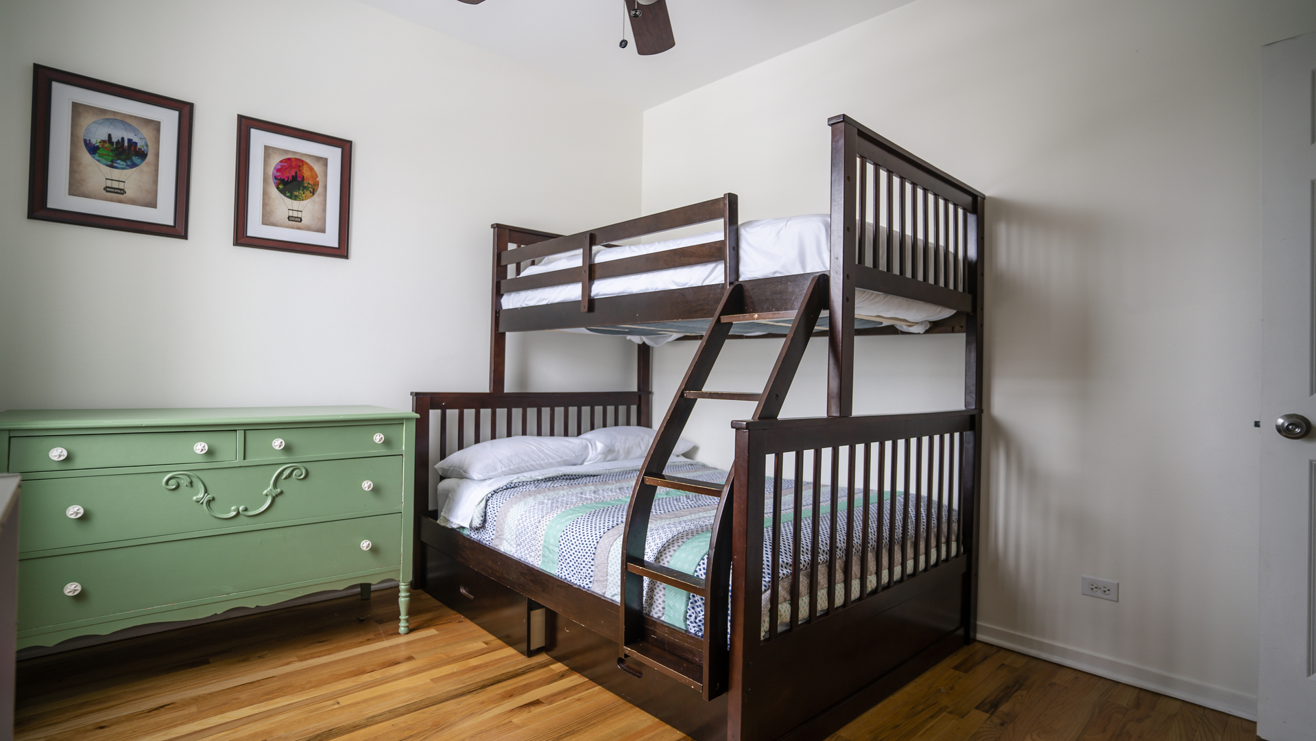 4660 North Spaulding Avenue, Unit 3 Chicago, IL 60625 - Photo 12 of 29 a bedroom with a bunk bed and a dresser