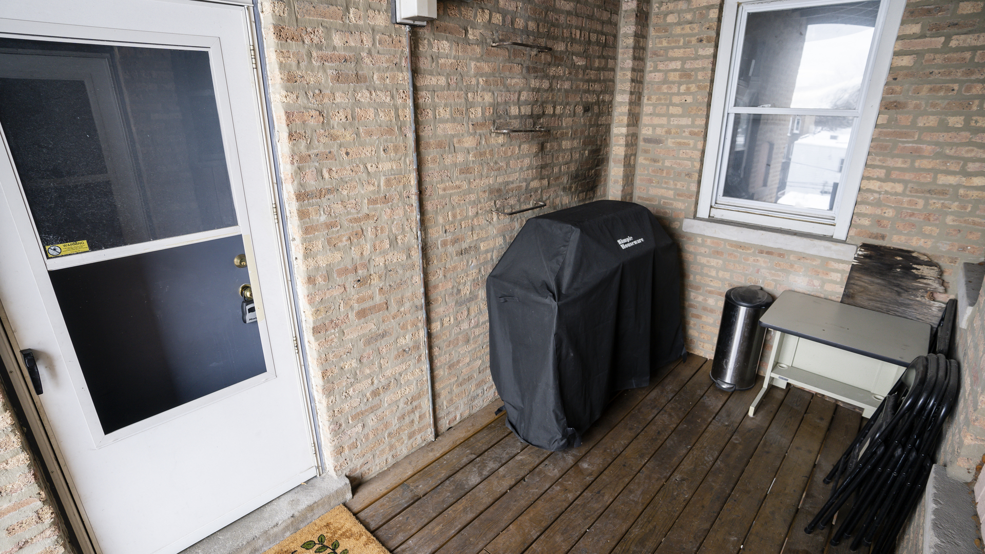4660 North Spaulding Avenue, Unit 3 Chicago, IL 60625 - Photo 29 of 29 a view of a balcony with wooden floor