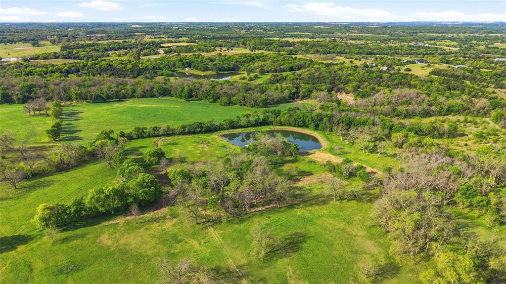 Lot 3 Us Highway Bells, TX 75414 - Photo 22 of 25 a view of a city with lush green forest
