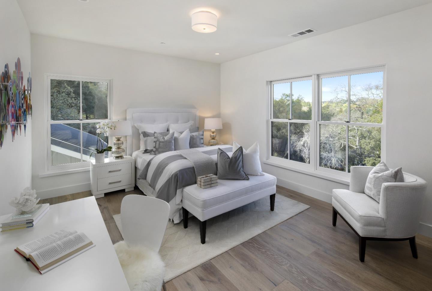 135 Dean Road Woodside, CA 94062 - Photo 15 of 31 a bedroom with a bed and glass window