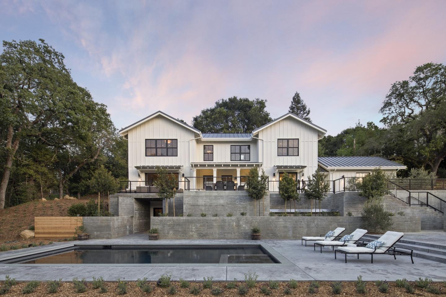 135 Dean Road Woodside, CA 94062 - Photo 2 of 31 a front view of a house with a yard