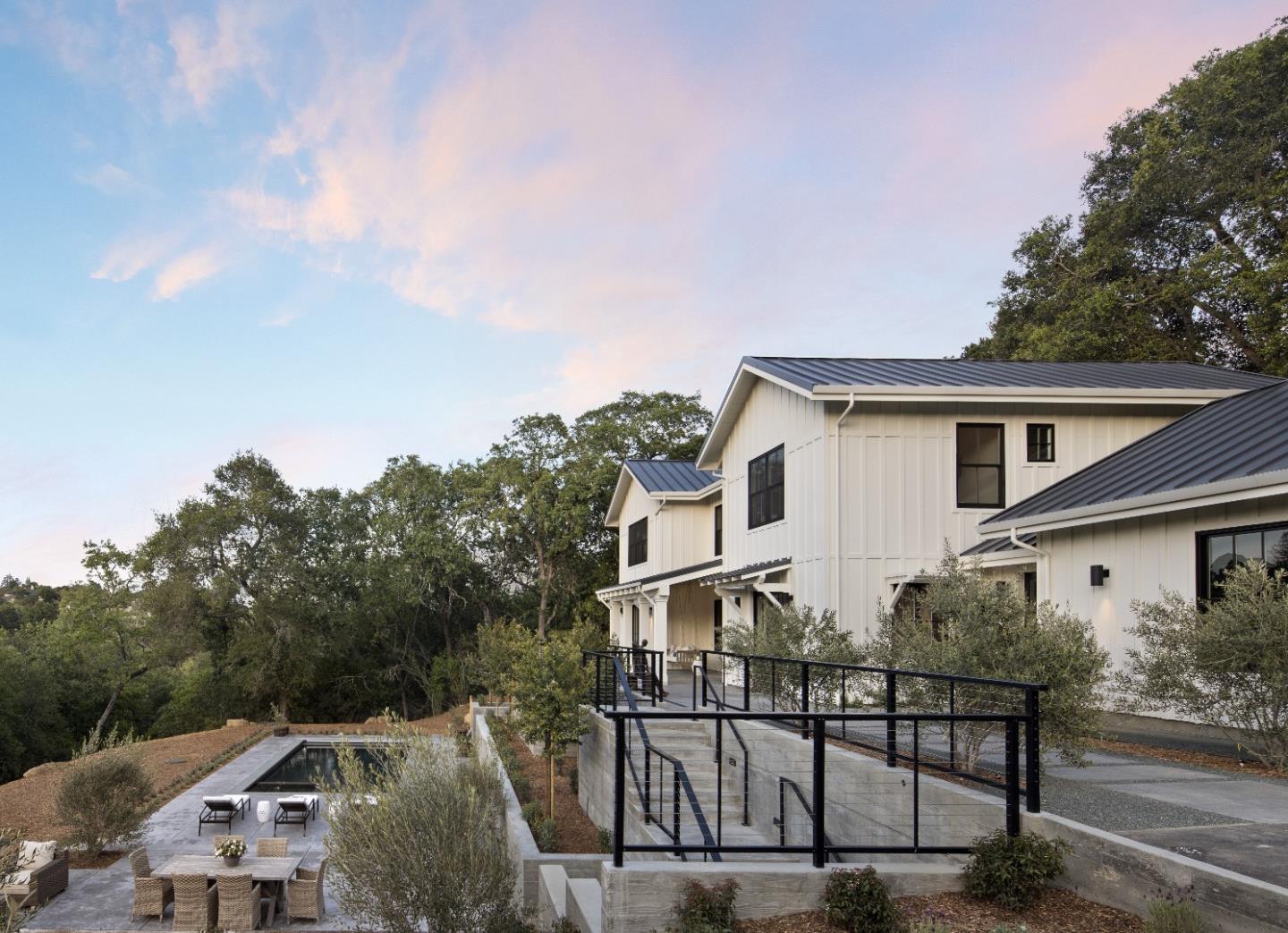 135 Dean Road Woodside, CA 94062 - Photo 30 of 31 a view of a house with wooden deck and backyard