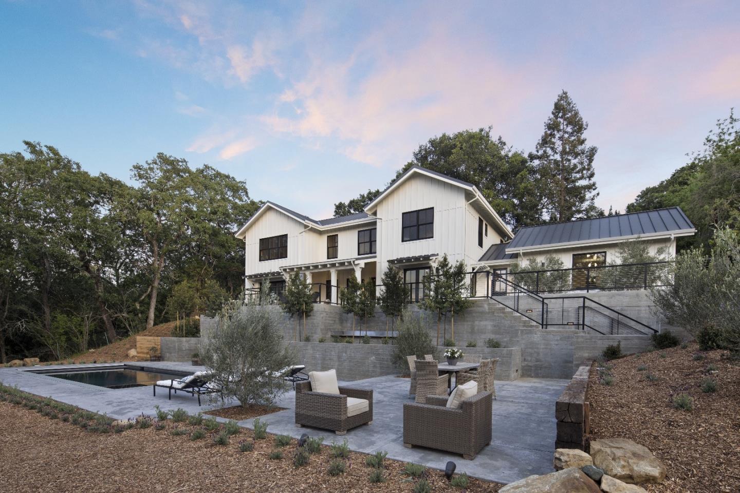 135 Dean Road Woodside, CA 94062 - Photo 4 of 31 a front view of a house with sitting space