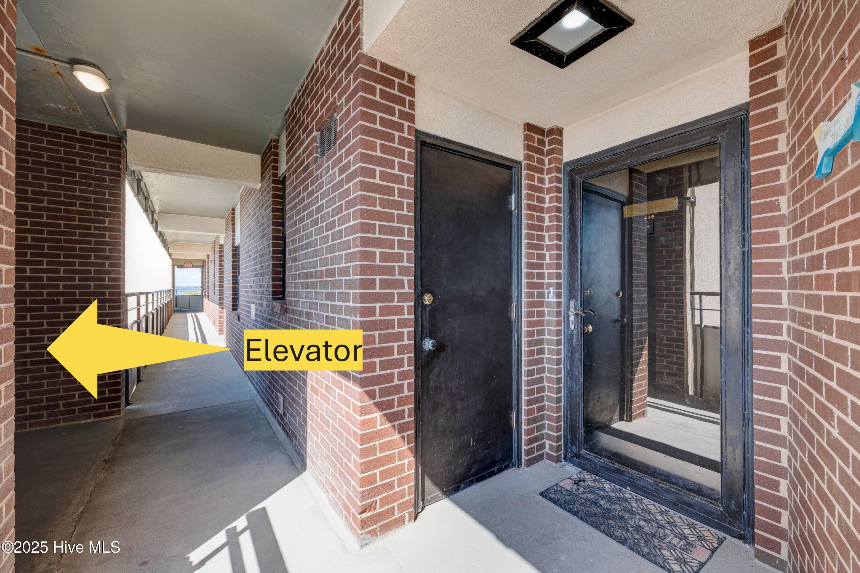 1505 Salter Path Road, Unit 435 Indian Beach, NC 28512 - Photo 4 of 29 1505SalterPathRoadUnit435-ELEVATORARROW