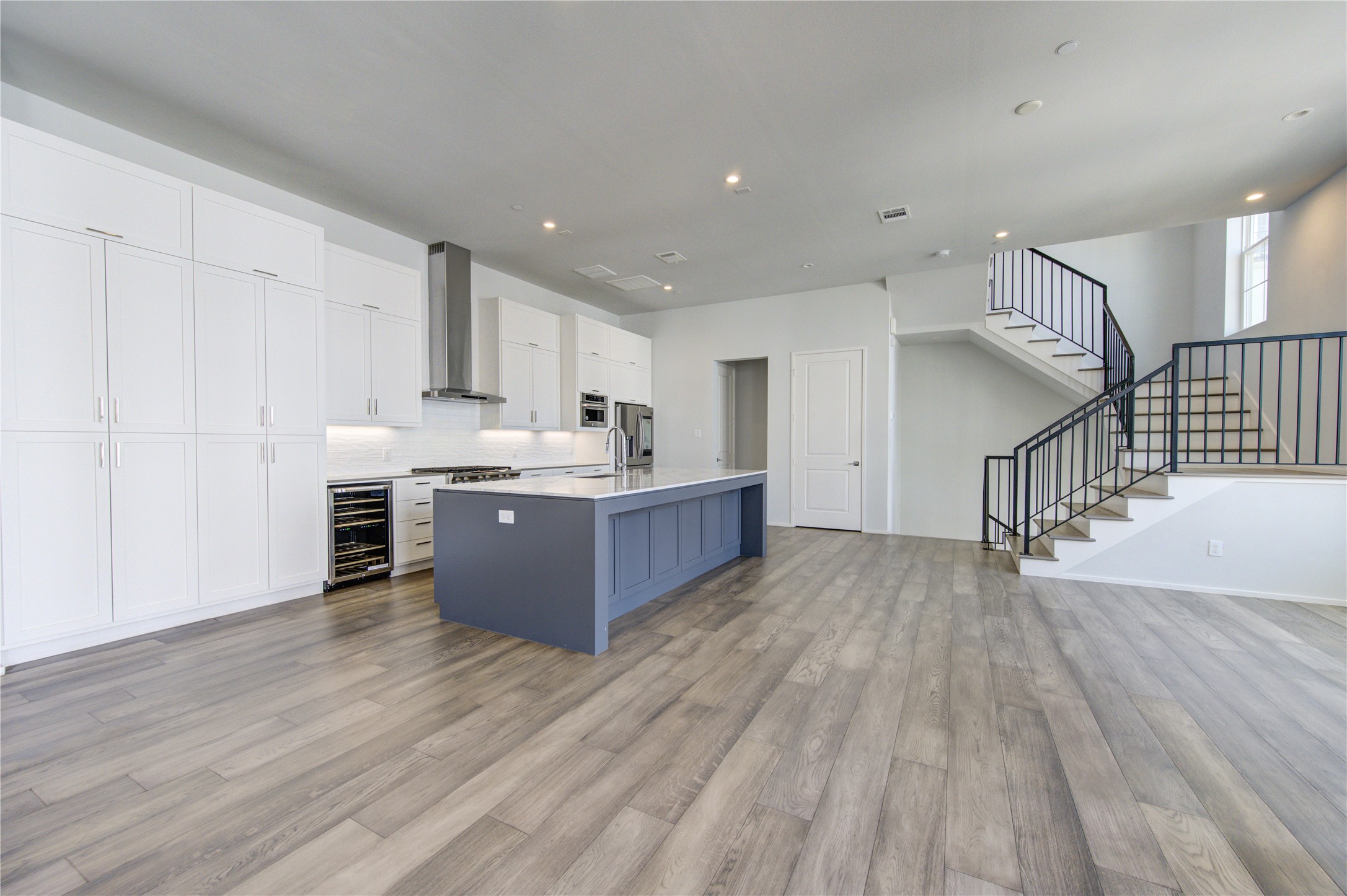 5336 Chandler Street Houston, TX 77007 - Photo 16 of 35 Tons of kitchen cabinet space & a wine fridge!