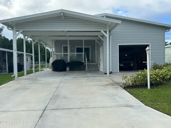 $314,900 | 919 Vireo Drive, Barefoot Bay, FL 32976