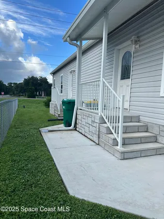 $314,900 | 919 Vireo Drive, Barefoot Bay, FL 32976