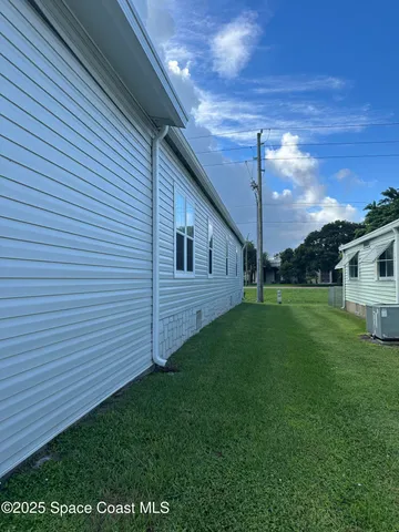 a view of a back yard of the house