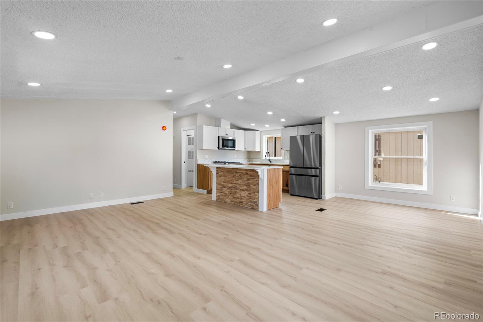 197 Pinto Street Golden, CO 80401 - Photo 3 of 19 a view of kitchen with refrigerator and window
