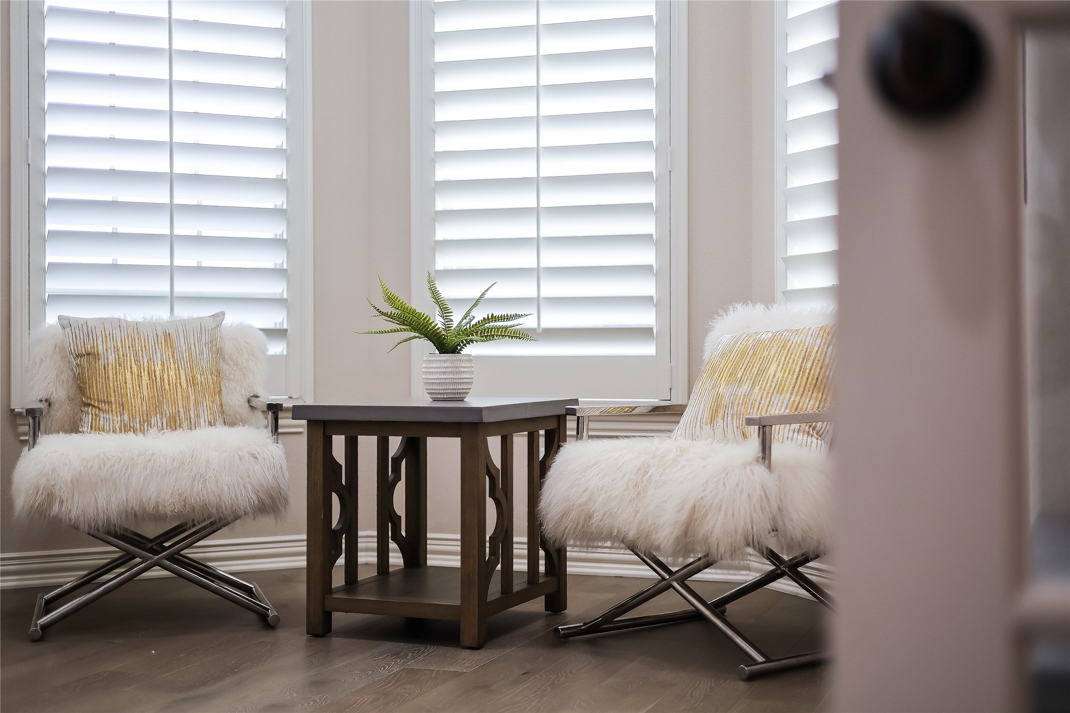 408 Ridgetop Bend Cedar Park, TX 78613 - Photo 20 of 40 Plantation shutters adorn the windows in this inviting, well-lit sitting area.
