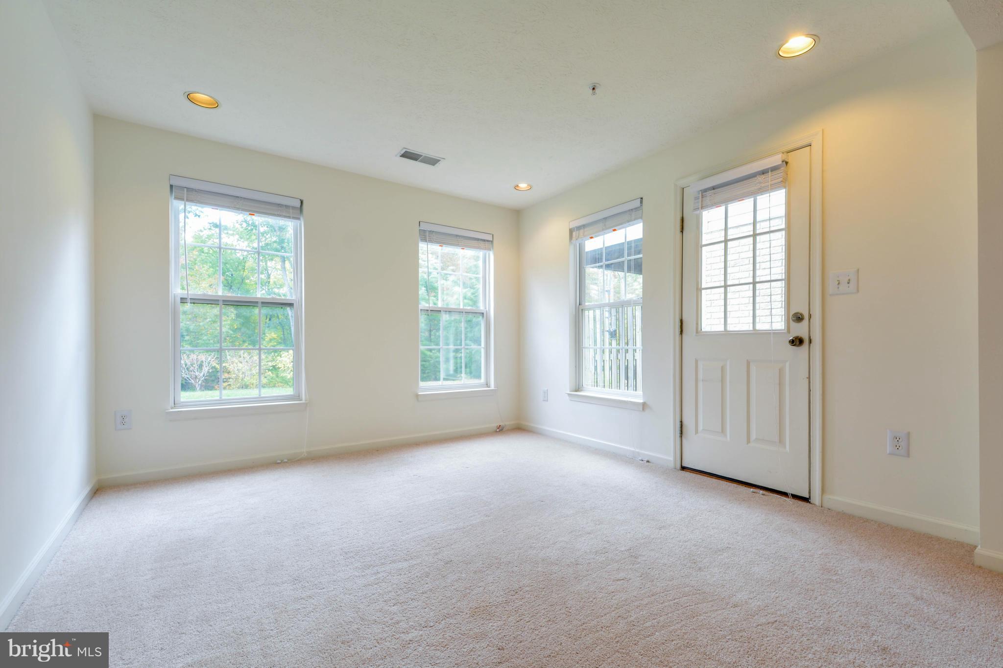 1447 Pangbourne Way Hanover, MD 21076 - Photo 14 of 30 a view of an empty room with a window