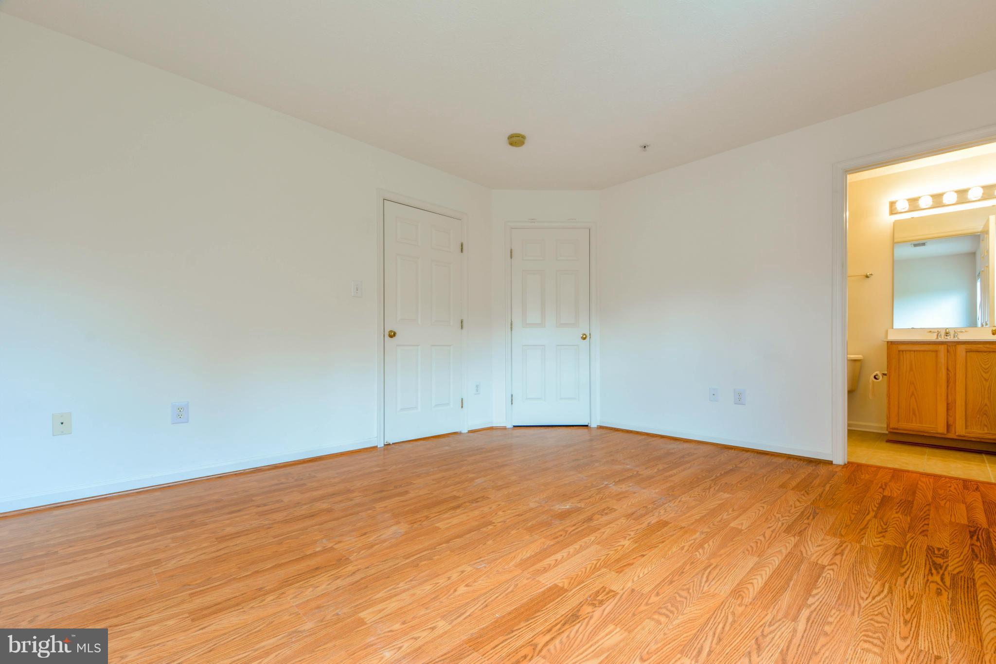 1447 Pangbourne Way Hanover, MD 21076 - Photo 20 of 30 a view of empty room with wooden floor