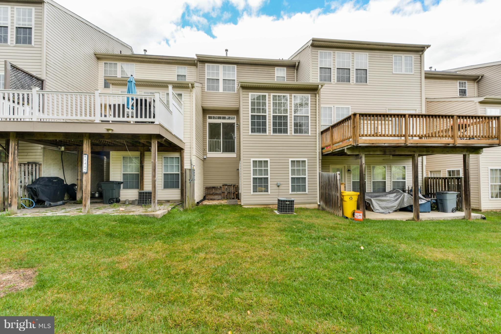 1447 Pangbourne Way Hanover, MD 21076 - Photo 30 of 30 a view of a house with a yard and sitting area