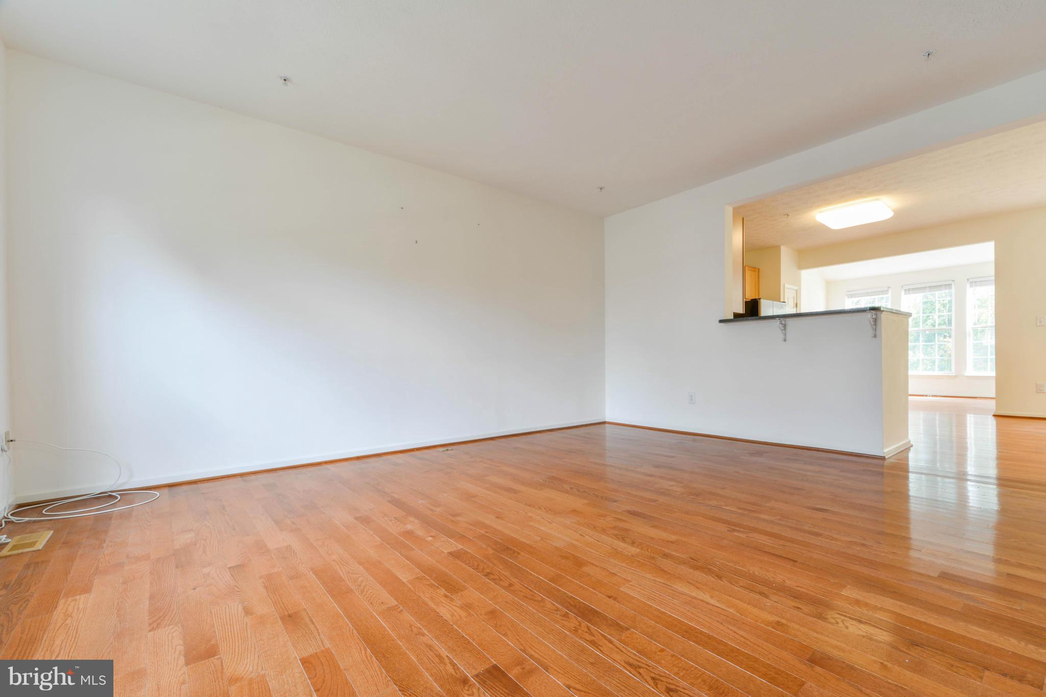 1447 Pangbourne Way Hanover, MD 21076 - Photo 4 of 30 a view of an empty room and window