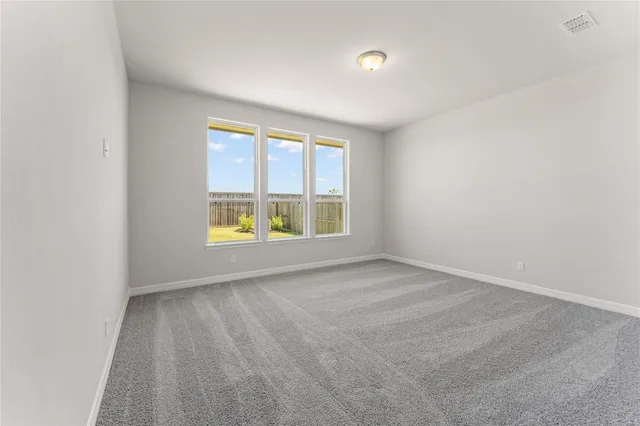 an empty room with a window