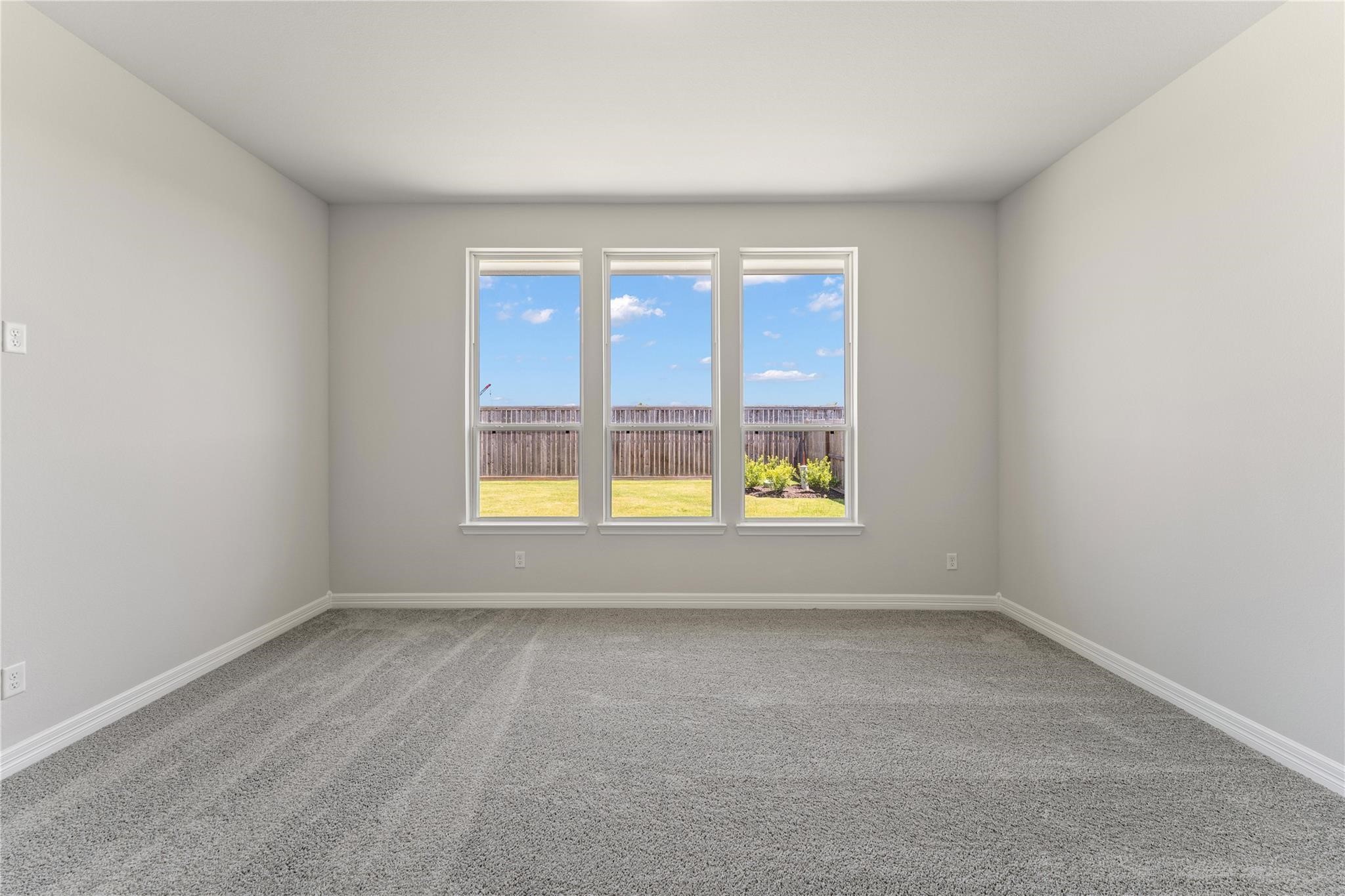 28938 Hauter Way Fulshear, TX 77441 - Photo 22 of 42 an empty room with a window