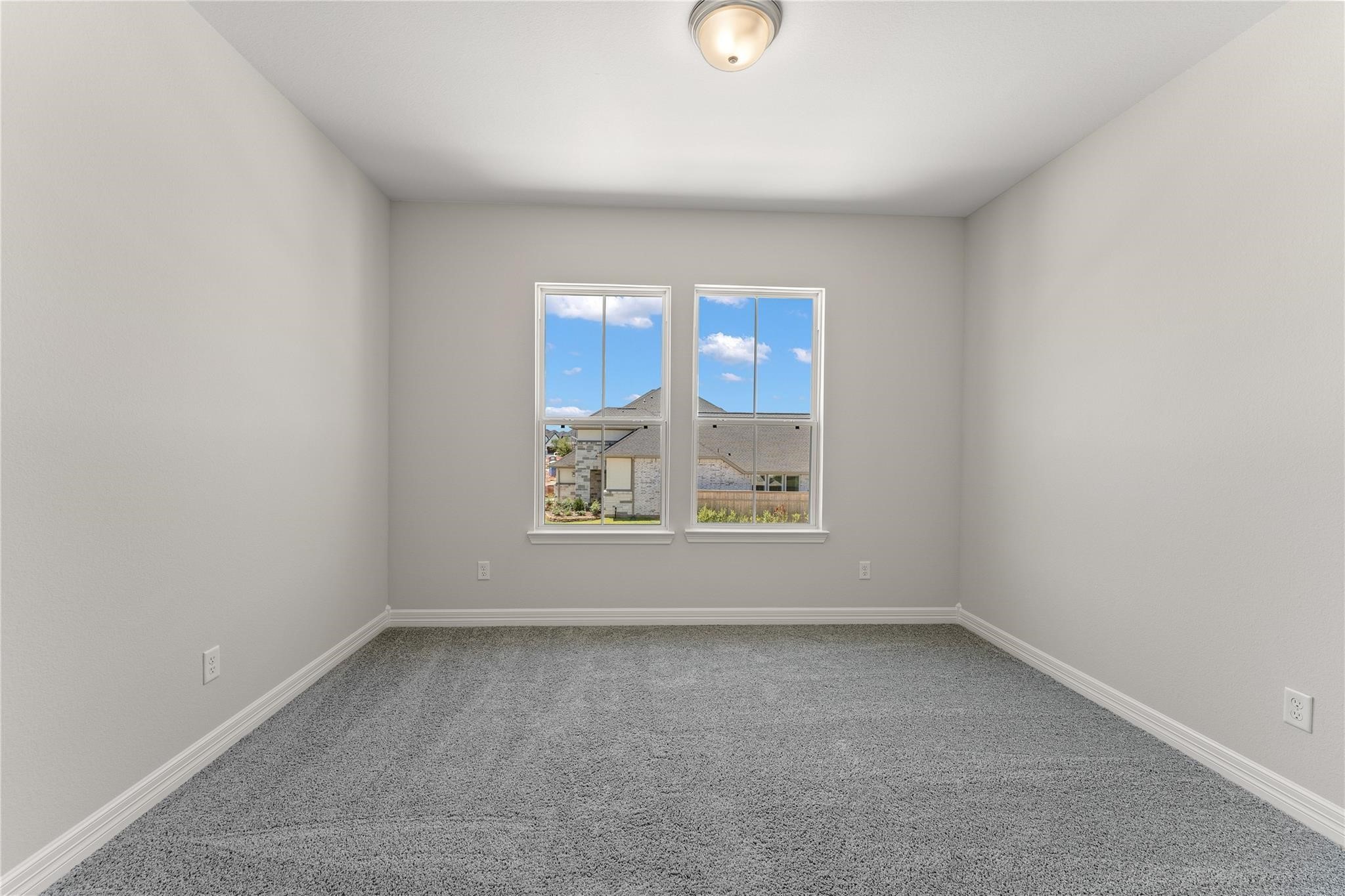 28938 Hauter Way Fulshear, TX 77441 - Photo 37 of 42 an empty room with a window