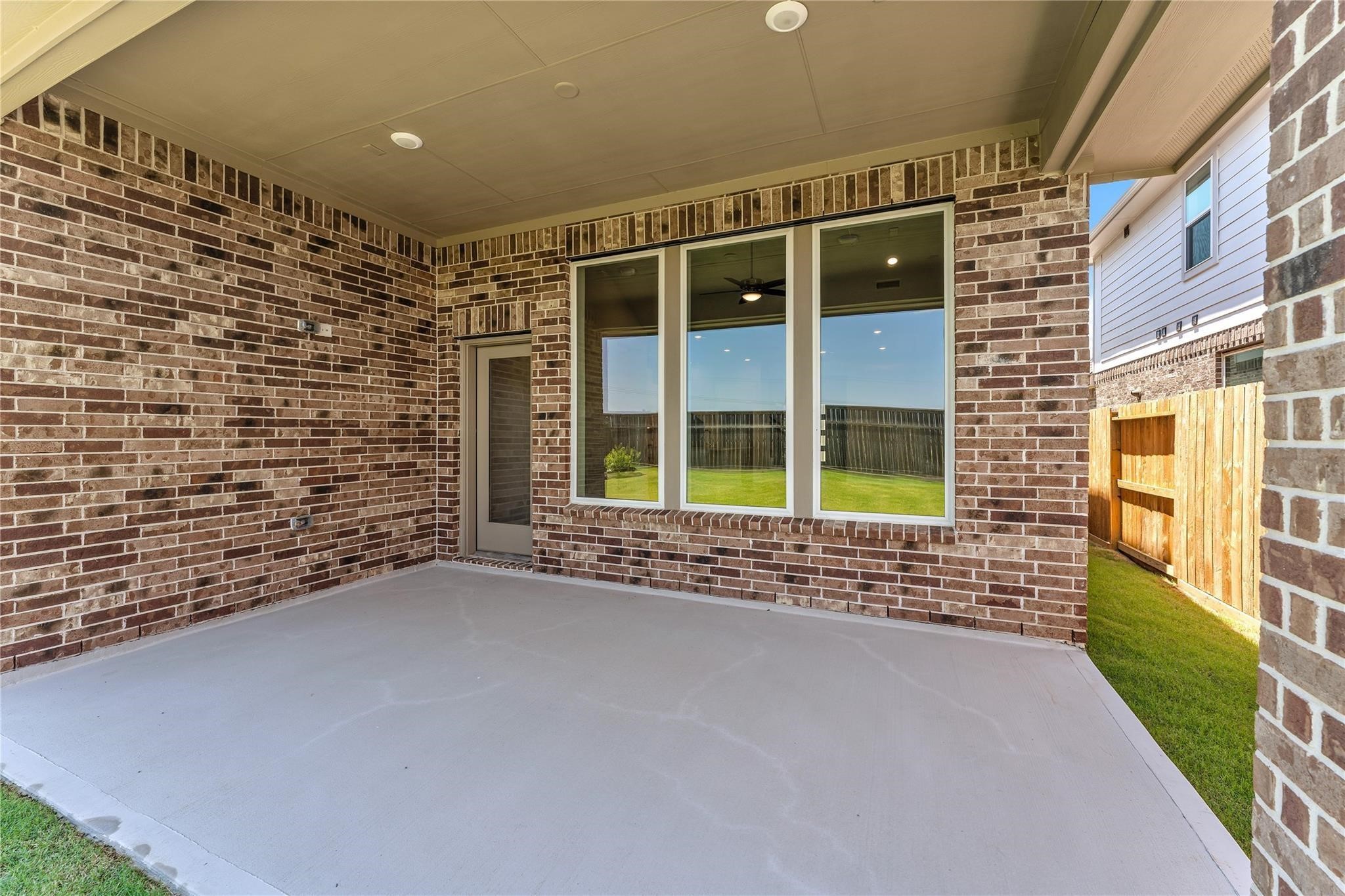 28938 Hauter Way Fulshear, TX 77441 - Photo 38 of 42 a view of an empty room with a window